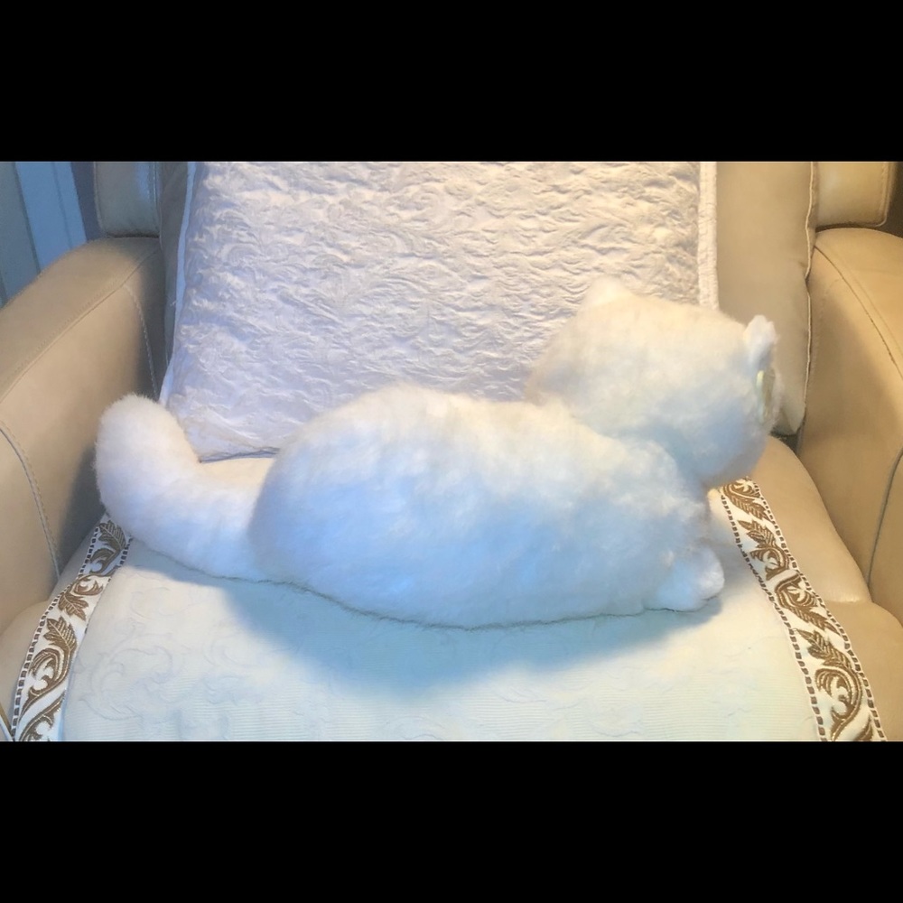 White stuffed animal cat